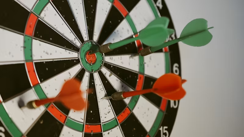 Dartboard with darts in it